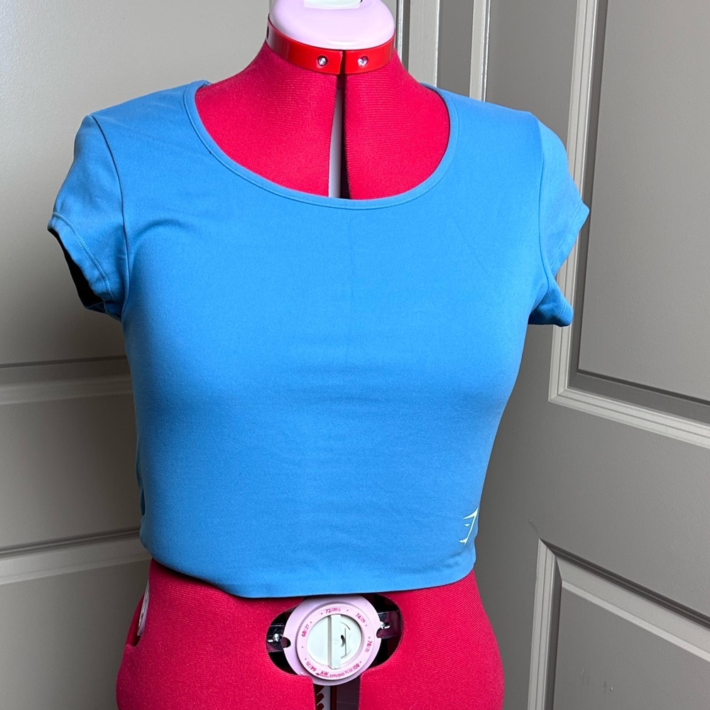 Never worn gymshark blue fitted baby tee